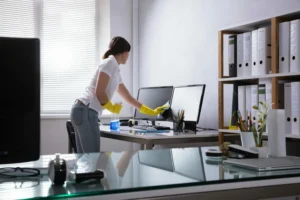 A leady cleaning office with green products.